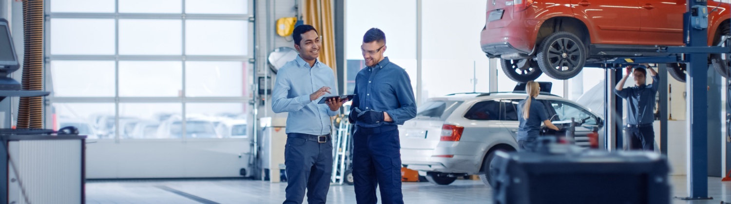 Automotive repair shop technicians performing vehicle maintenance and repairs in Hamilton ON